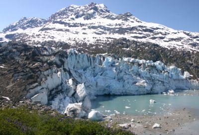 Calving glacier and remote mountain terrain in the East Arm of Glacier Bay, Alaska.