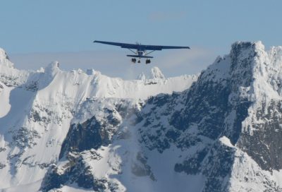 Bush plane transporting mountaineers into remote Alaska terrain for leadership and expedition courses.