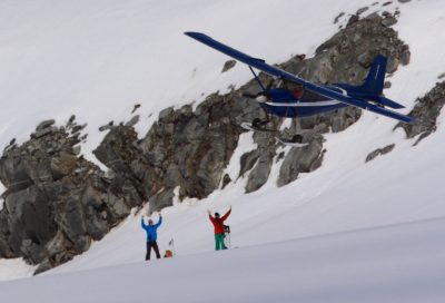 Skiplane landing in Alaska backcountry wilderness during Heli-ski excursion