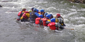 Students Practicing Swiftwater Rescue in Whitewater River